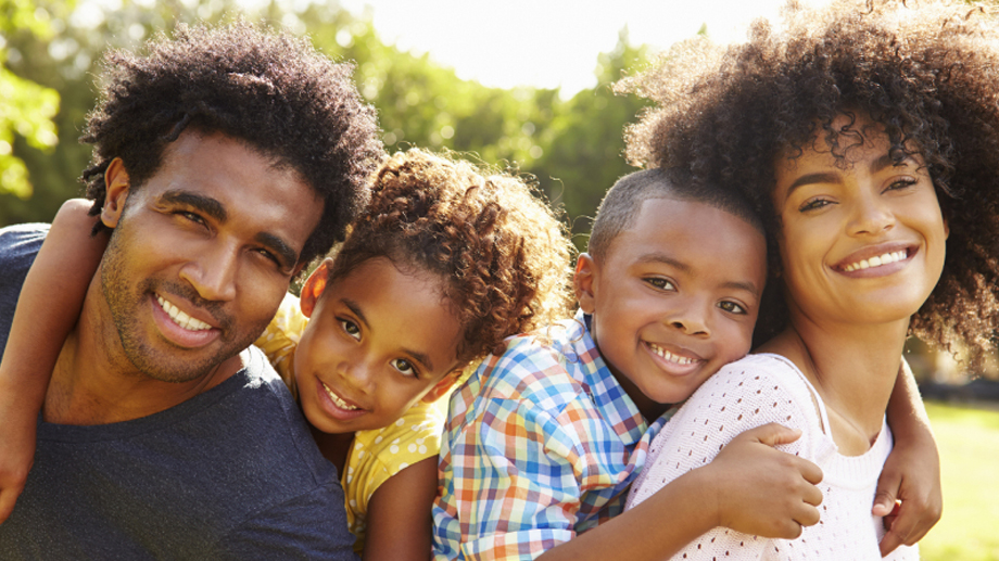 Multi-race Family Smiling Piggy Back